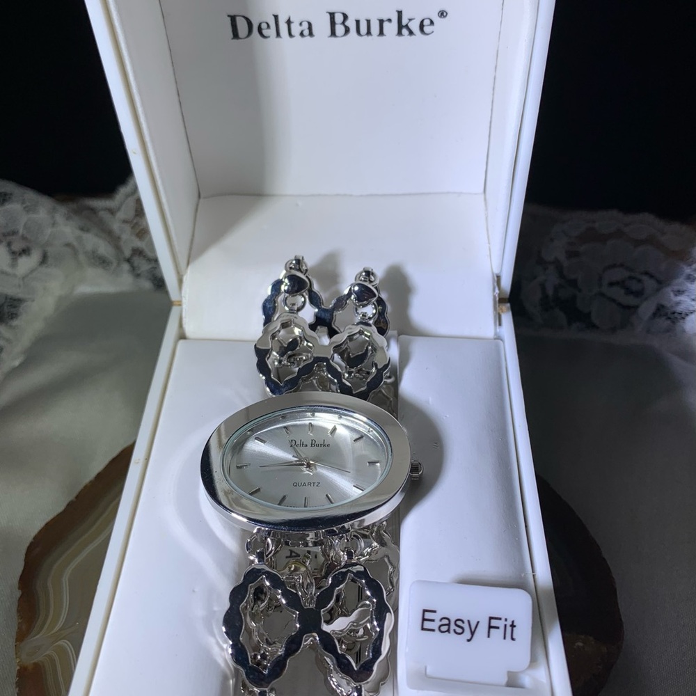 Delta Burke Silver and Black Quartz Watch,original box and paperwork